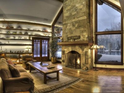 High-Ceiling-Living-Room-Design-with-Stone-Fireplace.jpg